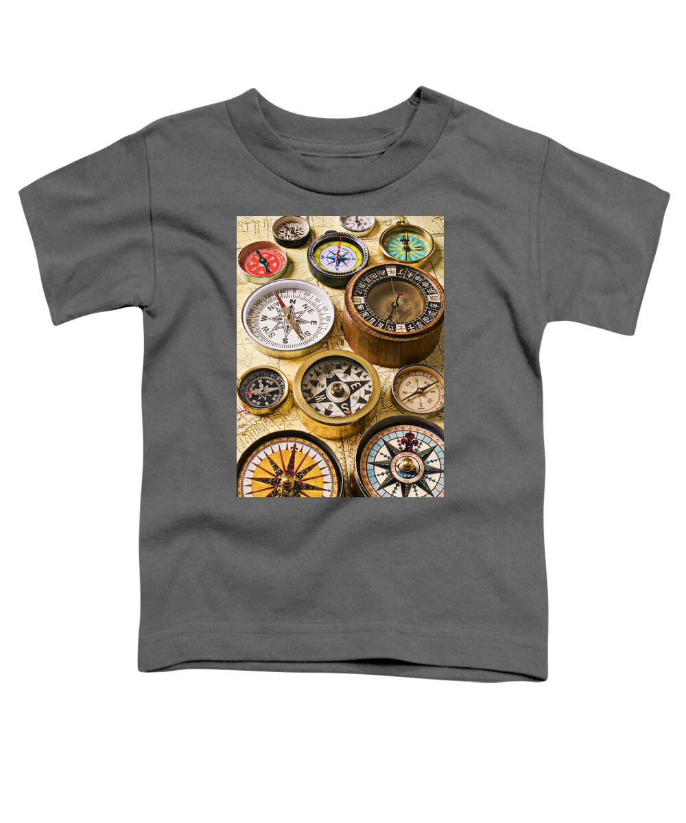 Compass Toddler T-Shirt featuring the photograph Assorted compasses by Garry Gay