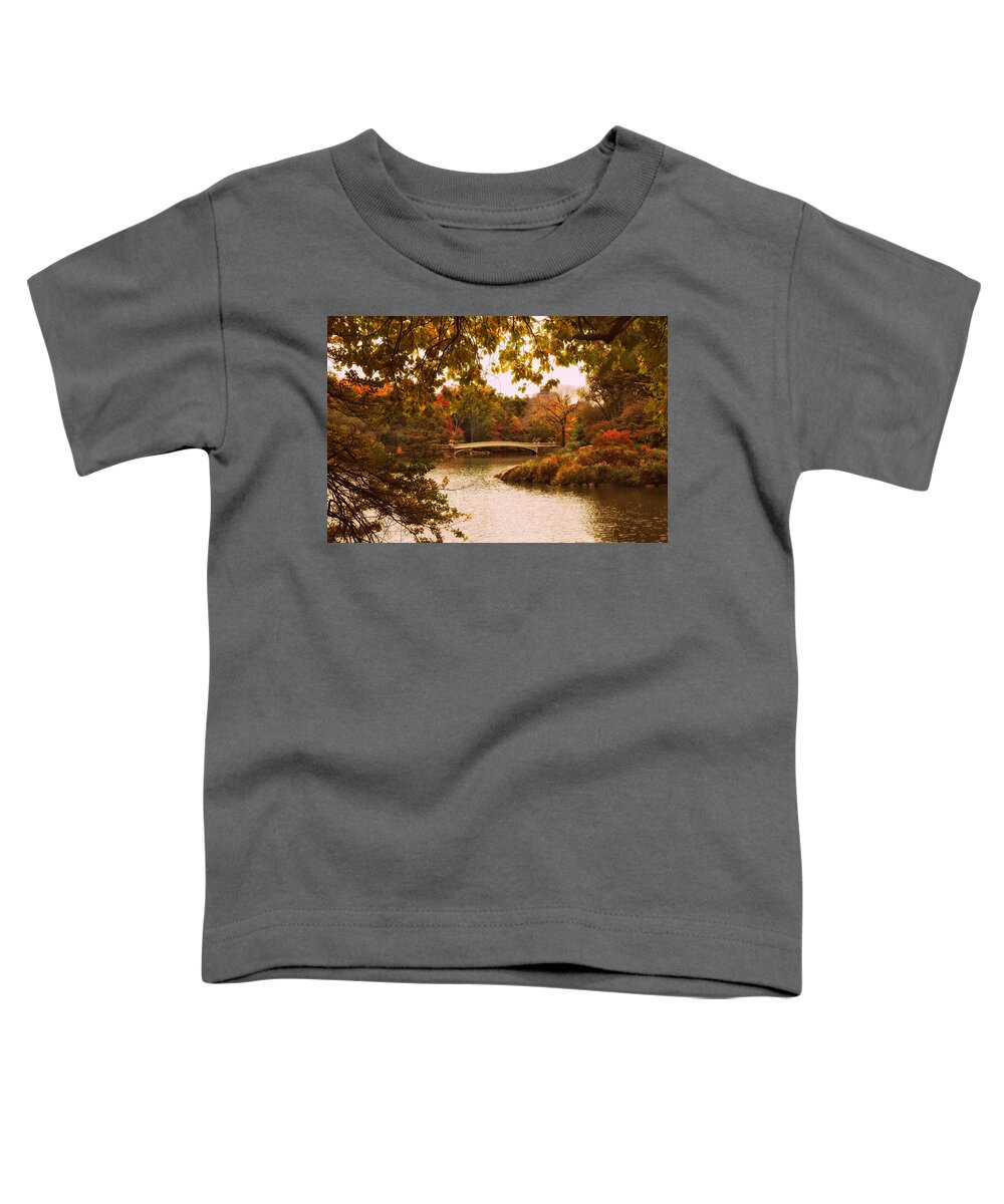 Bow Bridge Toddler T-Shirt featuring the photograph Autumn Crescendo at Bow Bridge by Jessica Jenney
