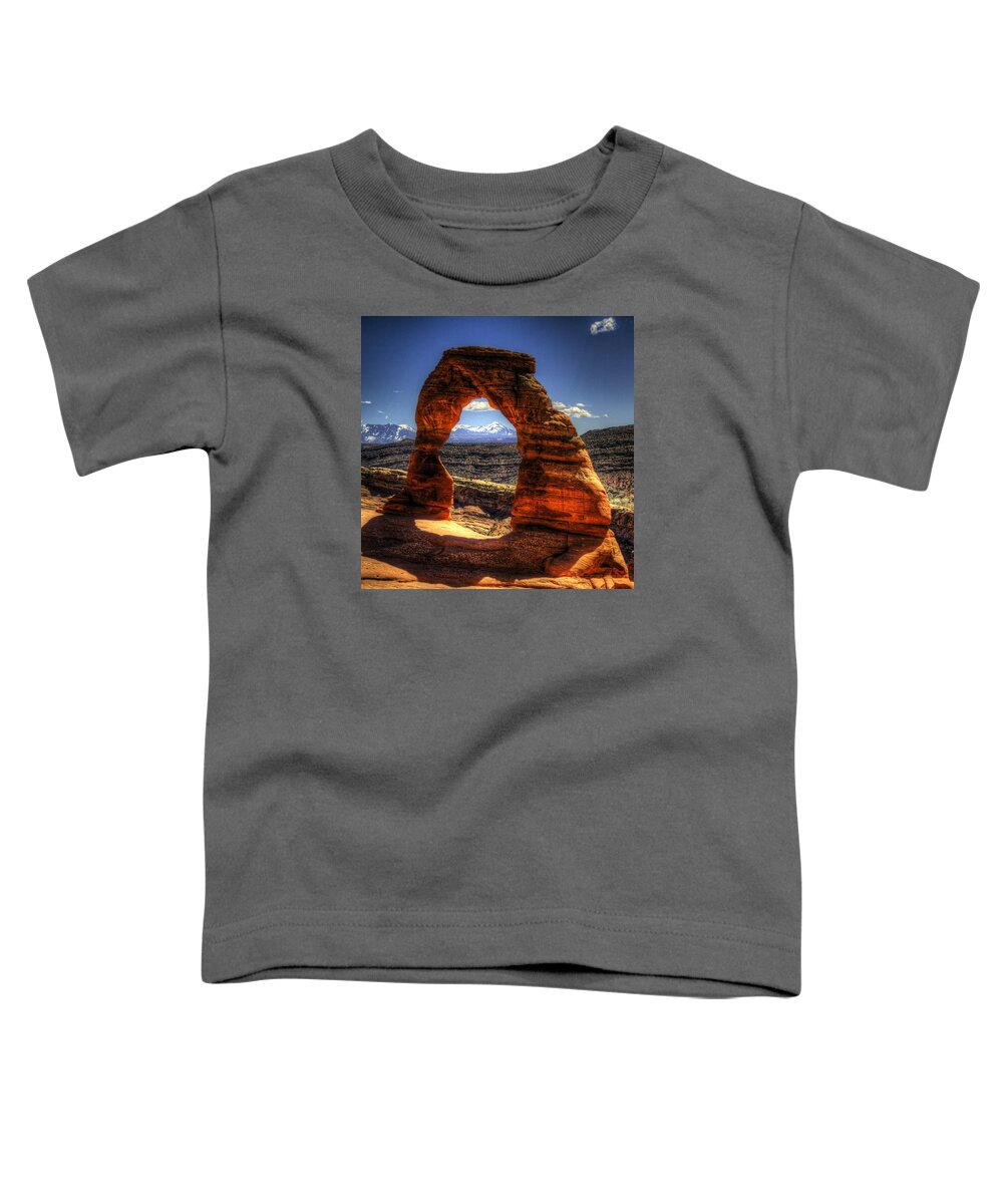 Pictorial Toddler T-Shirt featuring the photograph Delicate Arch Framing La Sal Mountains by Roger Passman