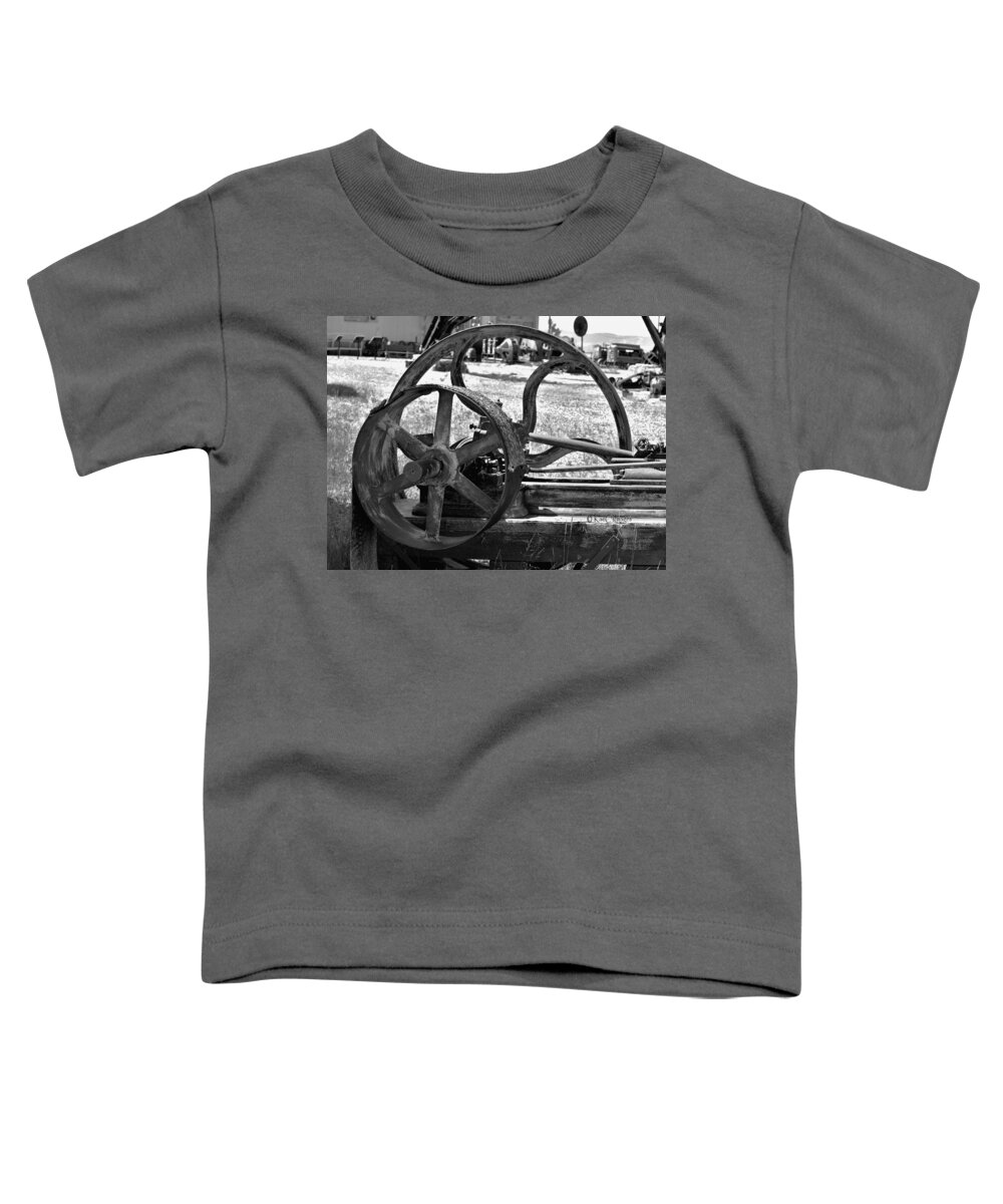 Conveyor Belt Toddler T-Shirt featuring the photograph Derelict Conveyor Belt and Drive Wheel in Black and White by Kae Cheatham
