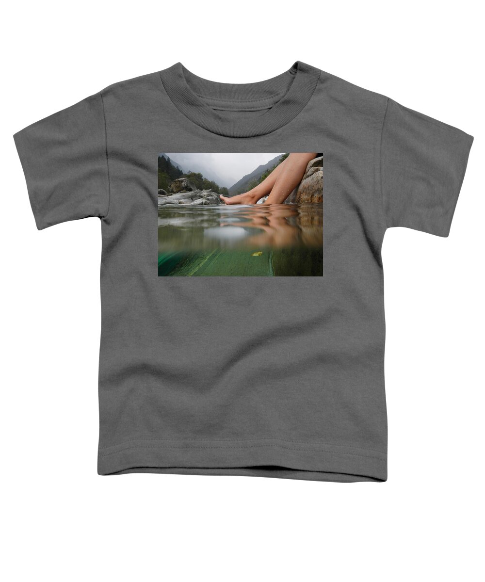 Feet Toddler T-Shirt featuring the photograph Feet on the water by Mats Silvan