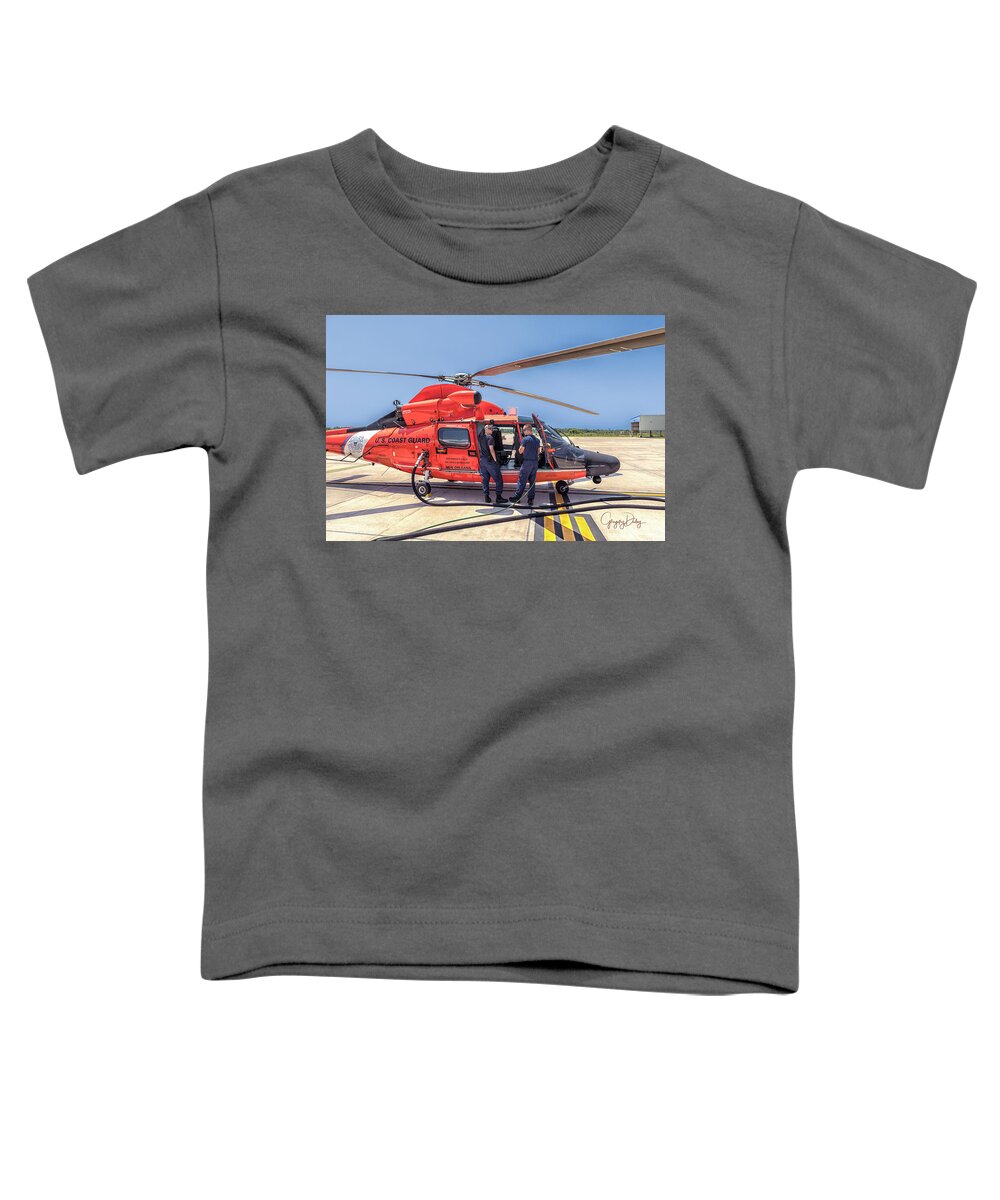 Us Coast Guard Air Station New Orleans All Hands Unit Photo Shoot Toddler T-Shirt featuring the photograph Fueling the Helicopter by Gregory Daley MPSA