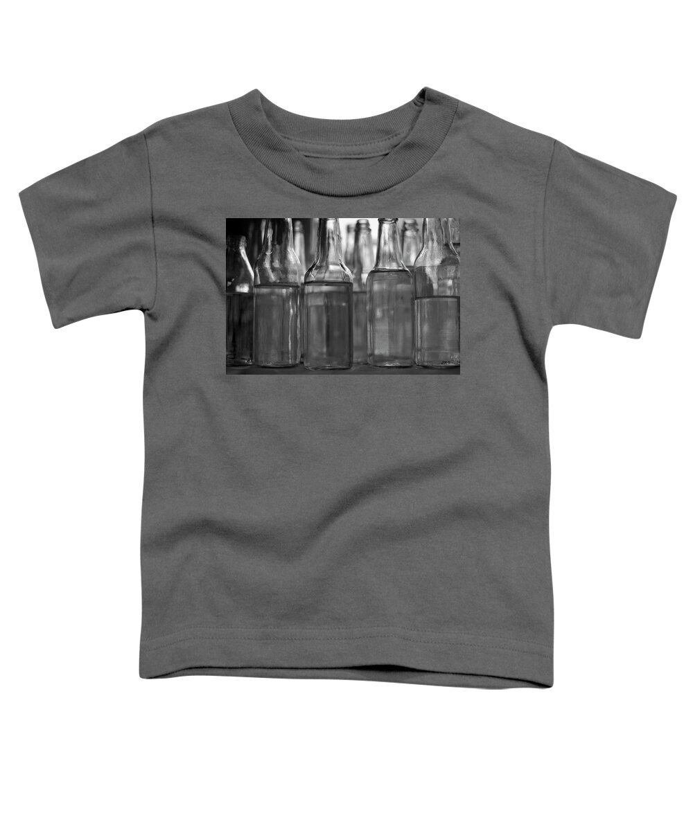 Bottle Toddler T-Shirt featuring the photograph Glass Bottles BW I by David Gordon