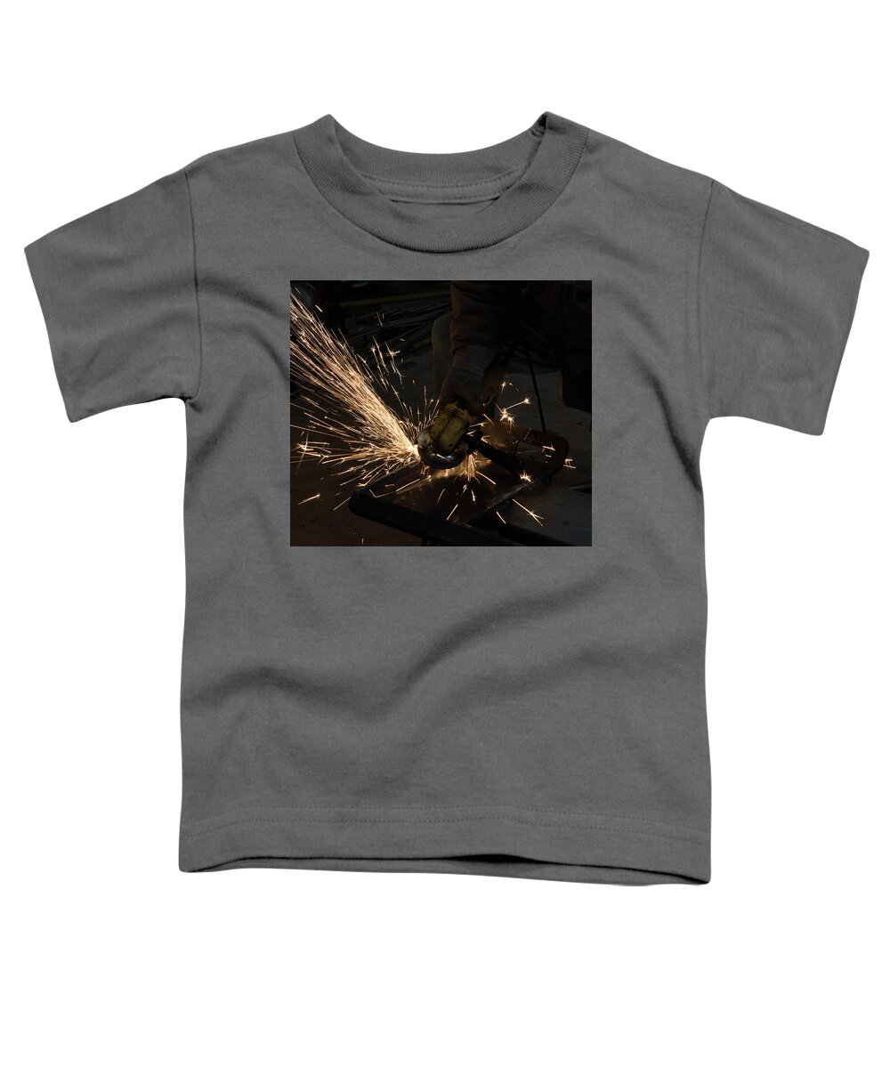Grinding Toddler T-Shirt featuring the photograph Grinding Steel by Michael Hall