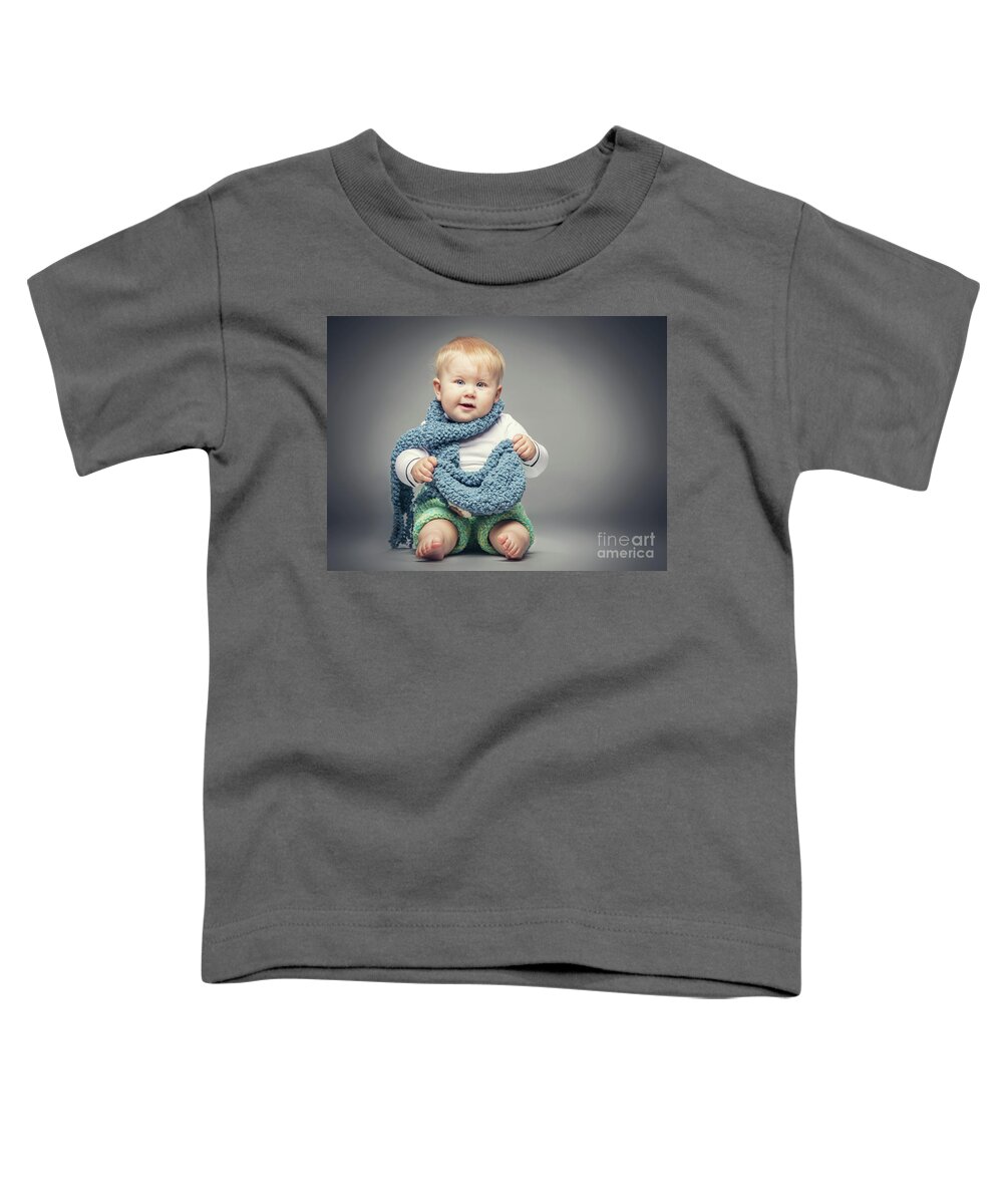 Kid Toddler T-Shirt featuring the photograph Little boy smiling at the camera. by Michal Bednarek