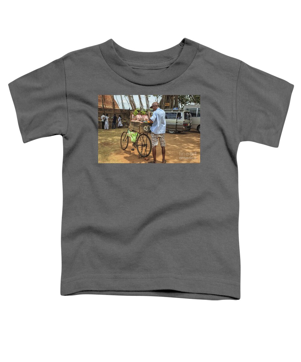 Sri Lanka Toddler T-Shirt featuring the photograph Man selling citrus fruit by Patricia Hofmeester