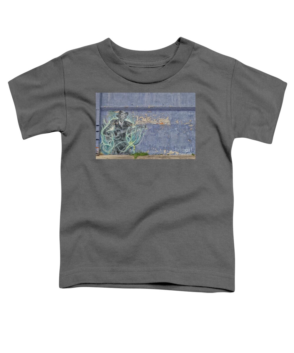 Art Toddler T-Shirt featuring the photograph Mural of Robert Johnson on a wall in Clarksdale by Patricia Hofmeester