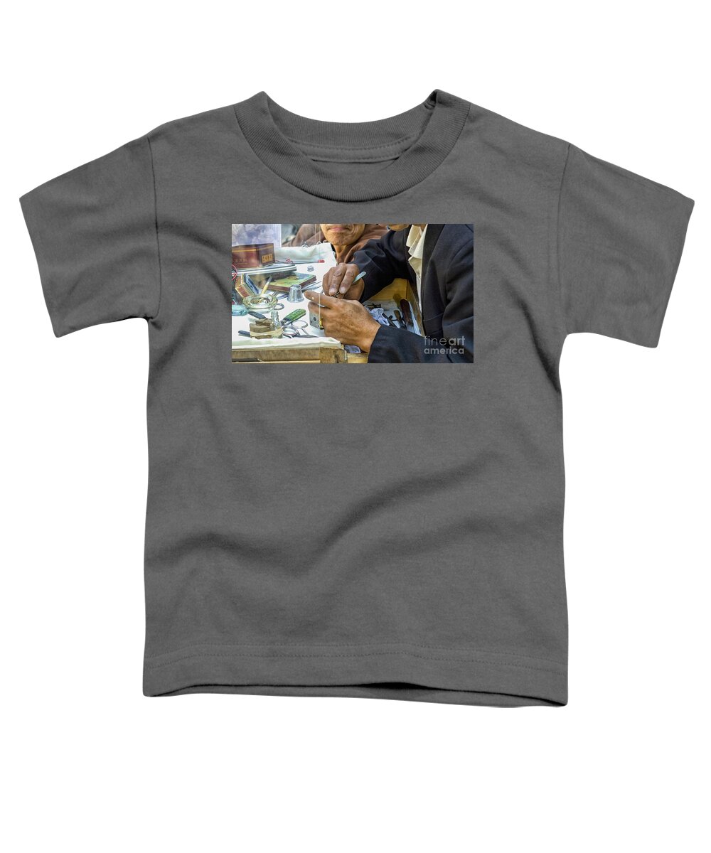 Asian Toddler T-Shirt featuring the photograph Outdoor repair of clockwork by Patricia Hofmeester