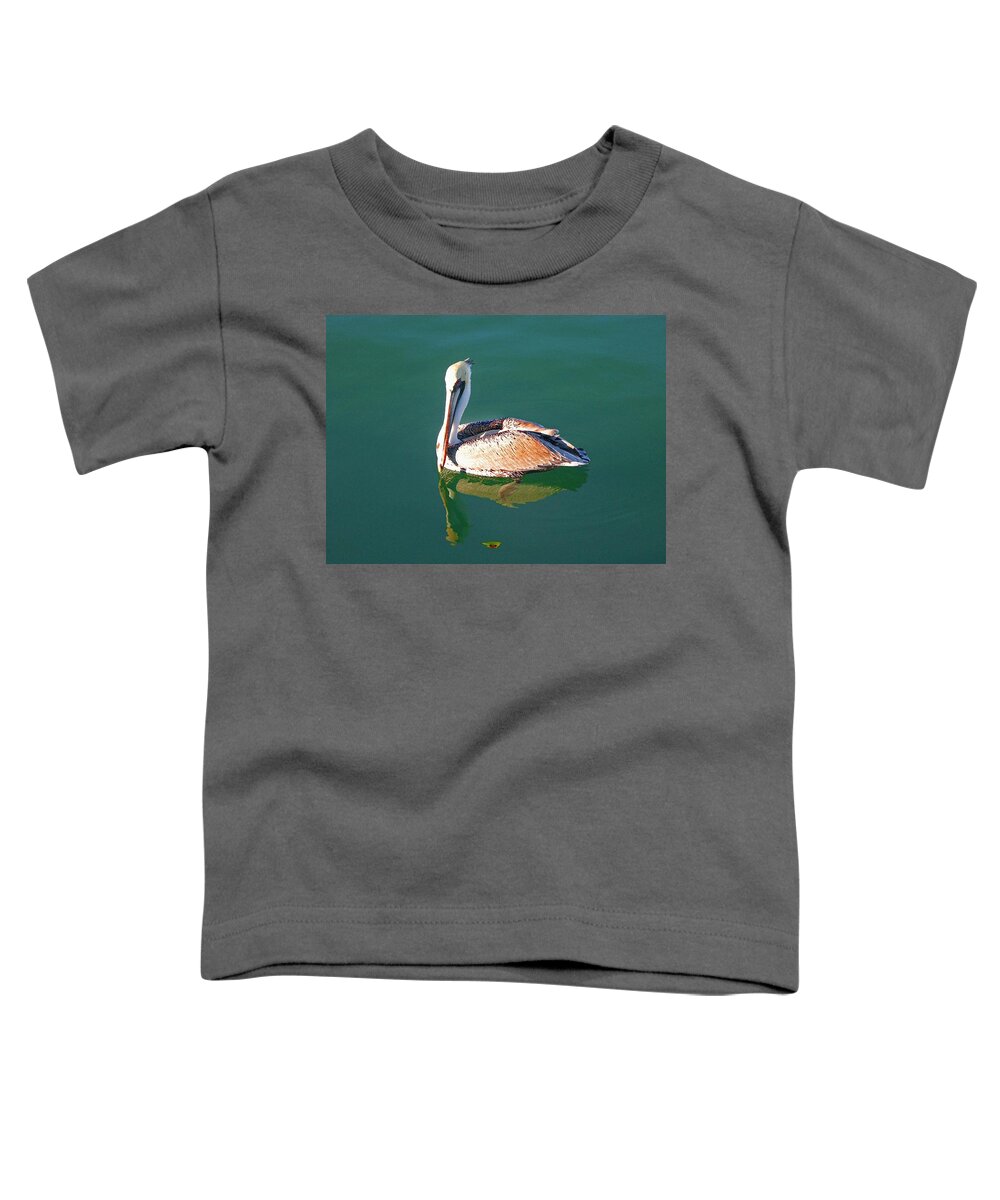 Pelican Reflection On Water Toddler T-Shirt featuring the painting Pelican Reflection by Michael Thomas