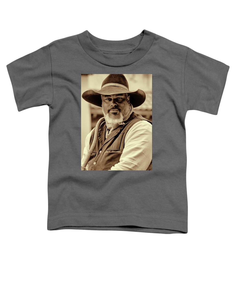 Cowboy Hat Toddler T-Shirt featuring the photograph Piercing Eyes of the Cowboy by Jeanne May
