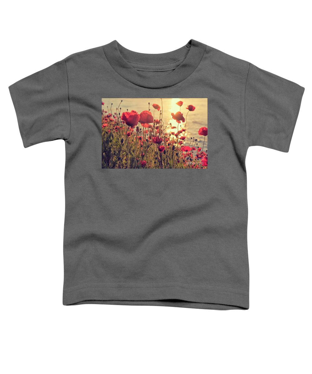 Poppy Toddler T-Shirt featuring the photograph Poppy flowers at sunset by Patricia Hofmeester