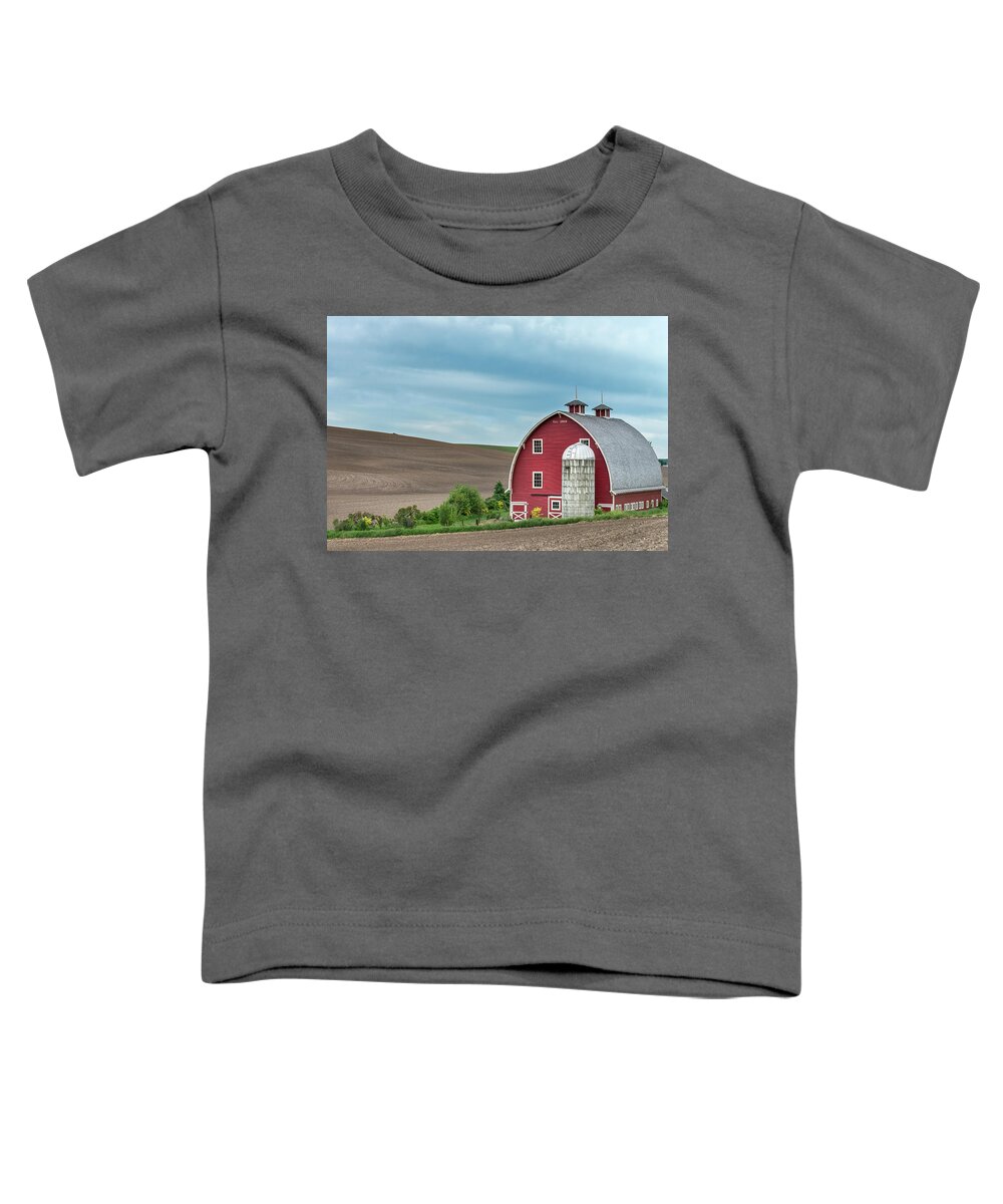 Agriculture Toddler T-Shirt featuring the photograph Red Barn in Palouse. by Usha Peddamatham