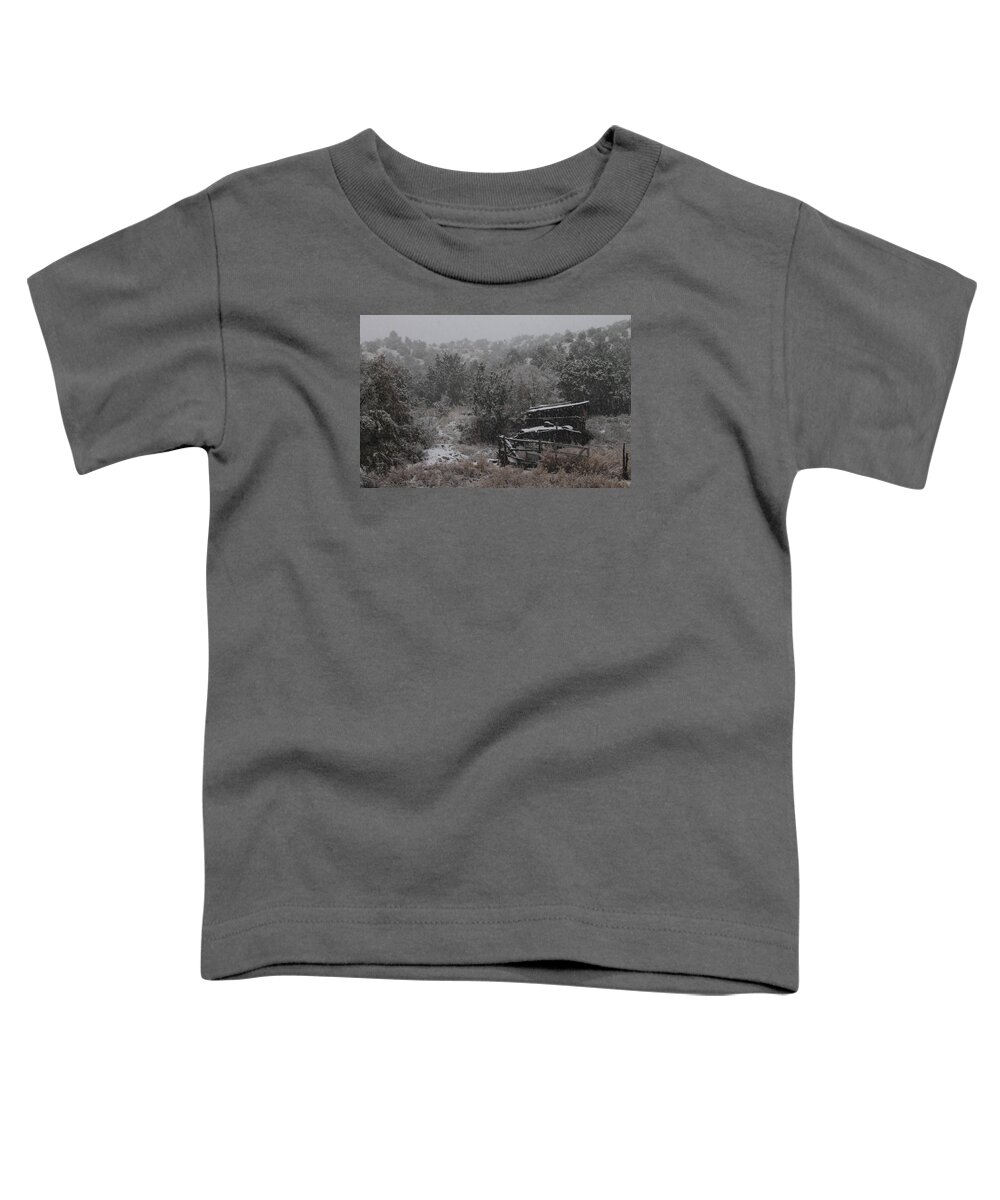 Snow Toddler T-Shirt featuring the photograph Snow in the Old Santa Fe Corral by Christopher J Kirby