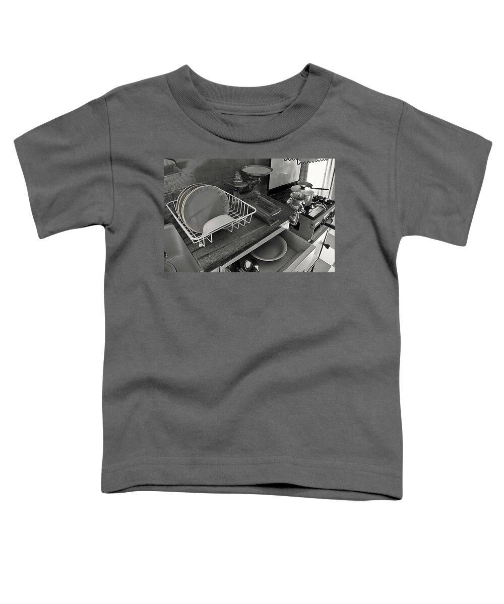 Welfare Toddler T-Shirt featuring the photograph The Art of Welfare. Kitchen cupboards. by Elena Perelman