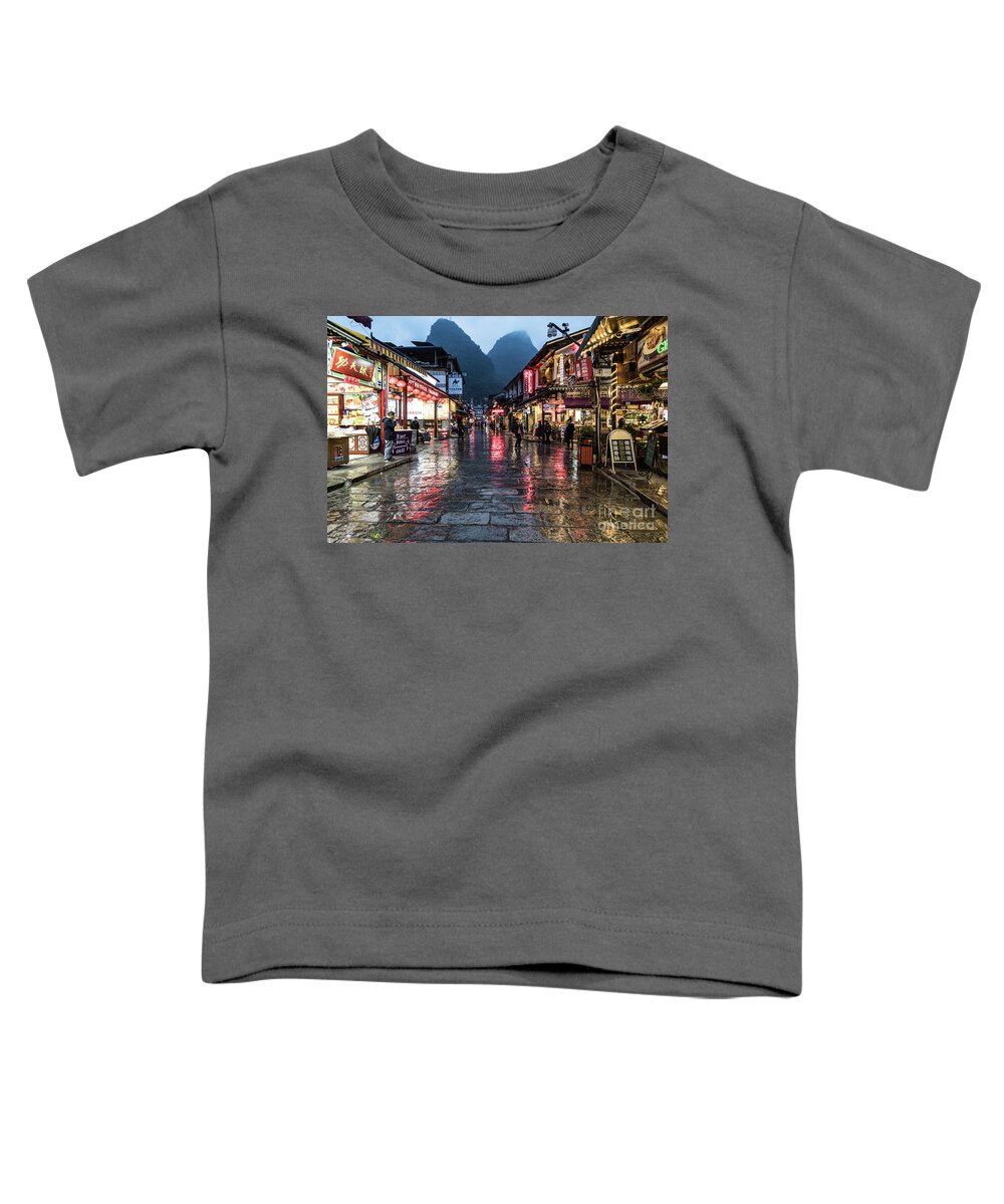 China Toddler T-Shirt featuring the photograph The famous West street in Yangshuo near Guilin in south China by Didier Marti
