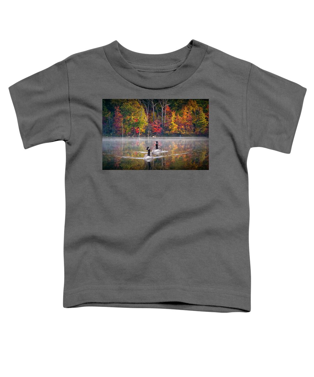 Canada Toddler T-Shirt featuring the photograph Two Canadian Geese swimming in Autumn by Randall Nyhof
