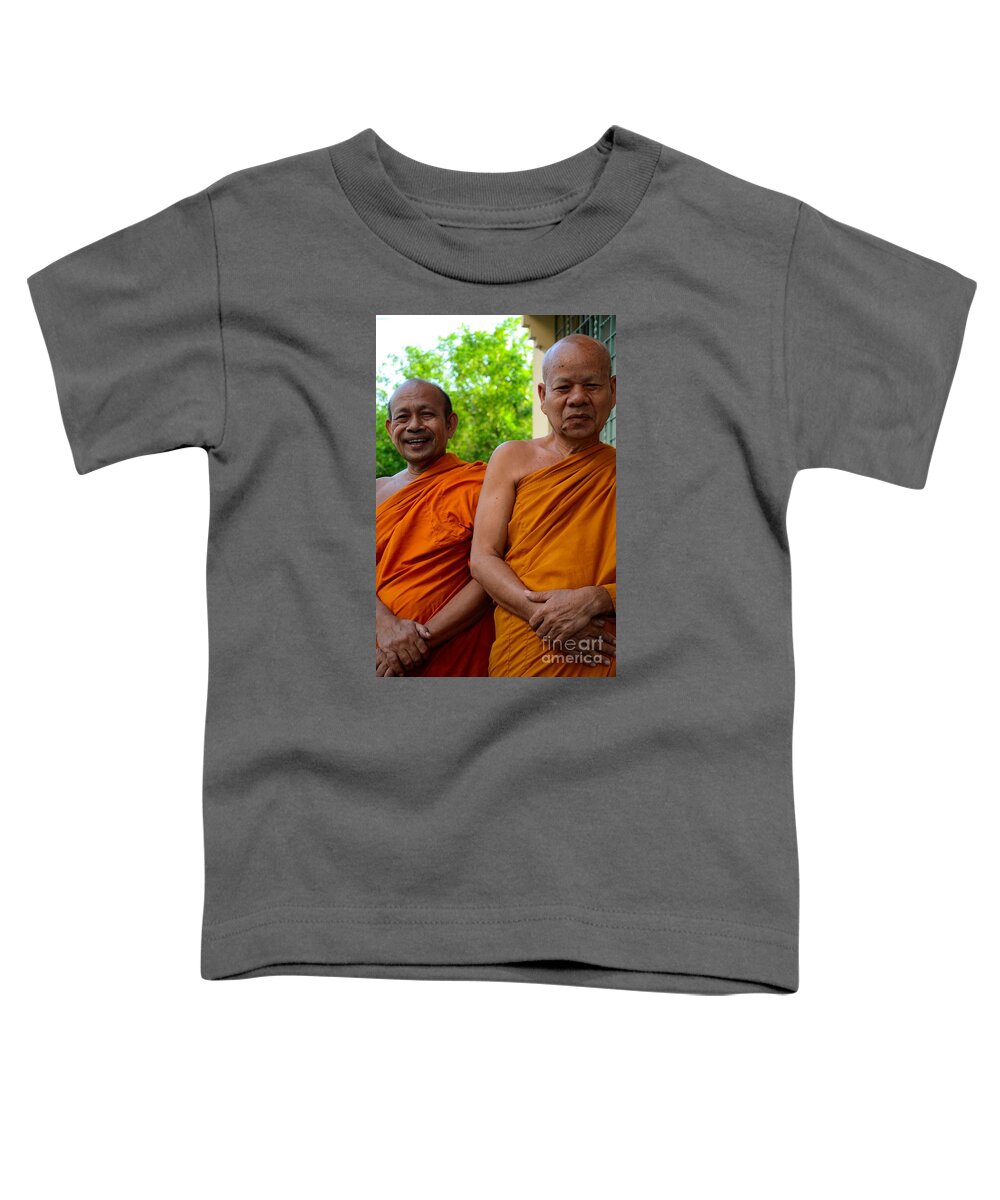 Monks Toddler T-Shirt featuring the photograph Two happy laughing Buddhist monks in robes Hat Yai Thailand by Imran Ahmed