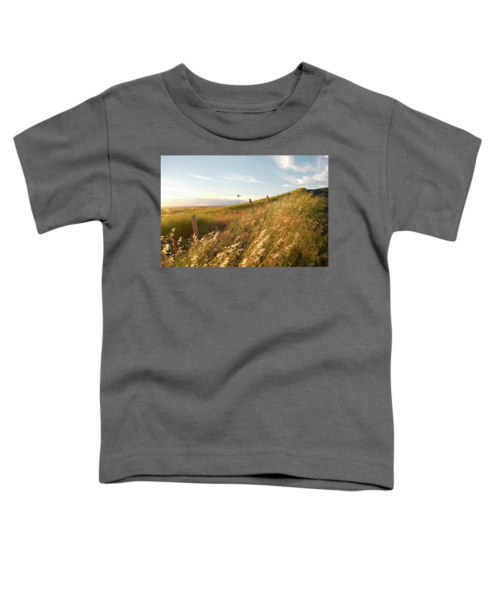 Windmill Toddler T-Shirt featuring the photograph Windmill and the Fence Sundown by Troy Stapek