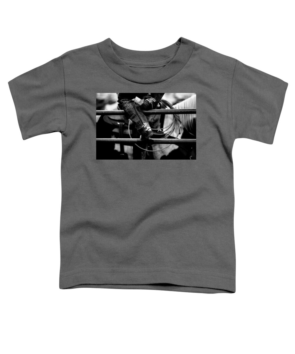 Cowboy Toddler T-Shirt featuring the photograph Worn Denim and Boots in black and white by Toni Hopper
