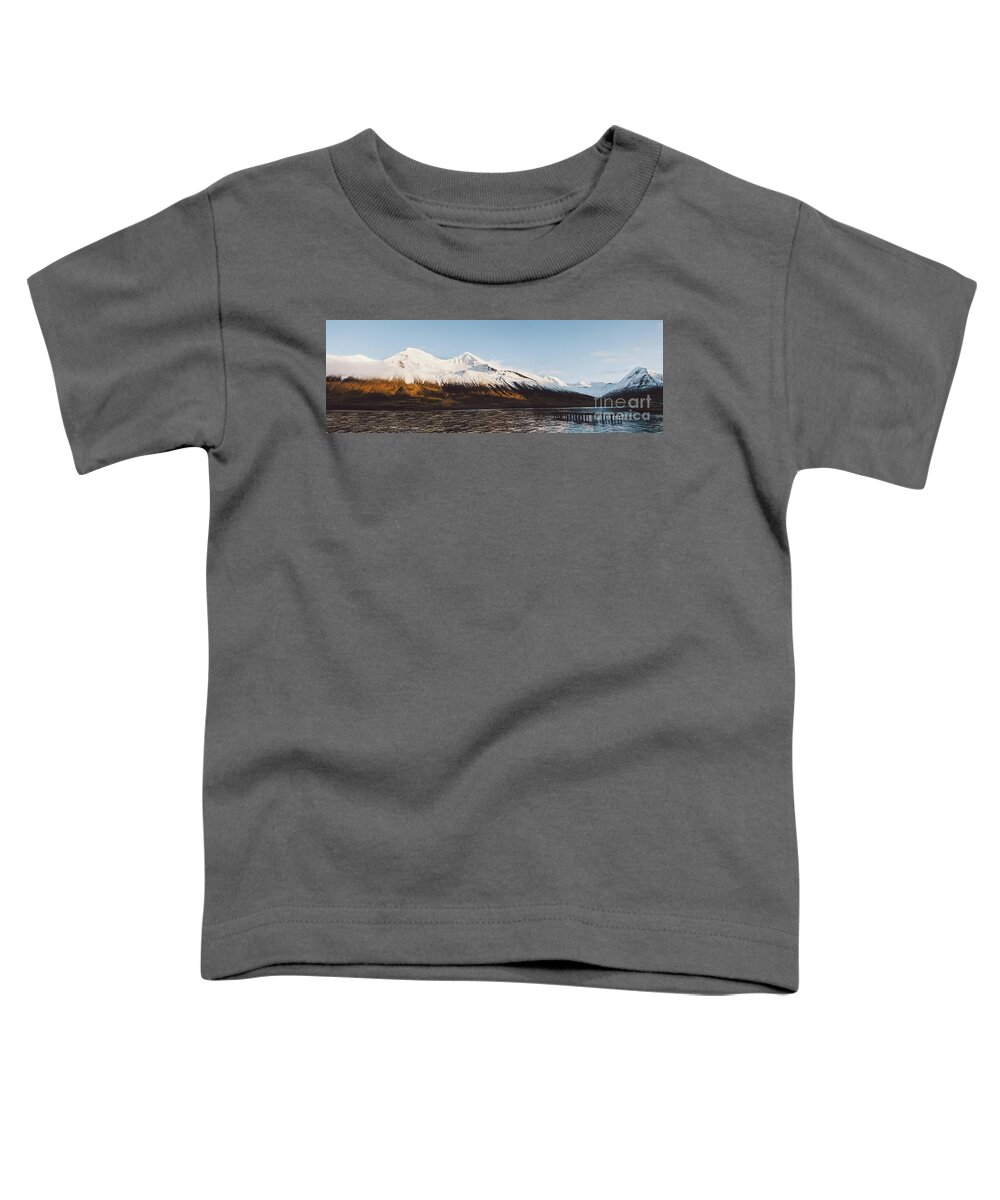 Adventure Toddler T-Shirt featuring the photograph Beautiful scene of a landscape with high snowy mountains and sea. #4 by Joaquin Corbalan