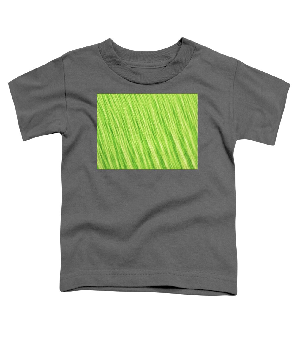 Abstract Toddler T-Shirt featuring the photograph Bright chartreuse green blurred diagonal lines abstract by Teri Virbickis