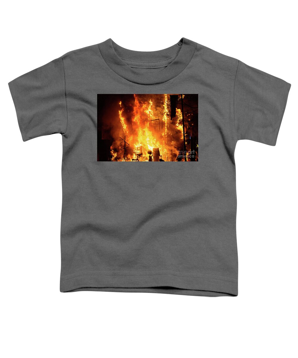 Artist Toddler T-Shirt featuring the photograph Detail of a Falla Valenciana burning between flames of fire. by Joaquin Corbalan
