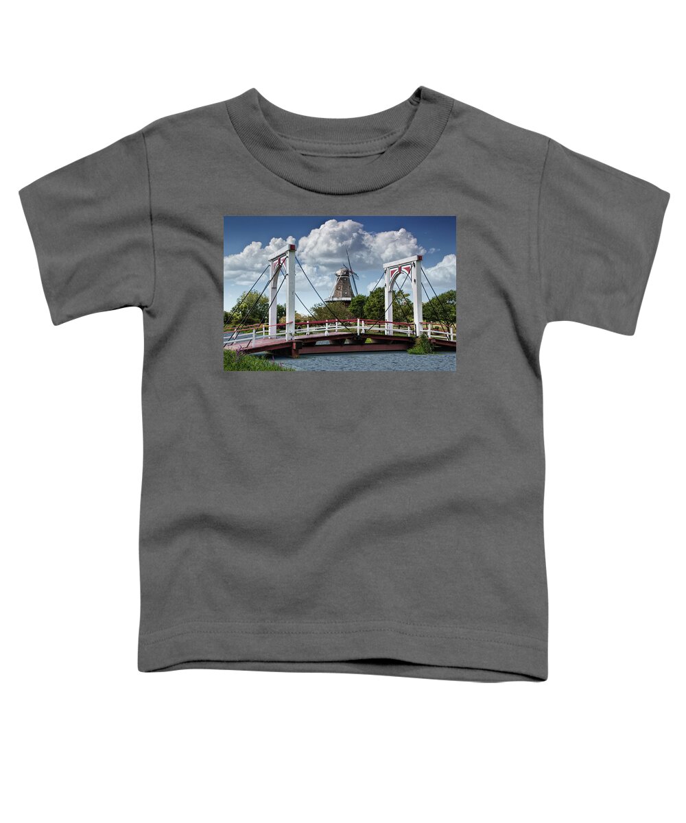 Windmill Toddler T-Shirt featuring the photograph Dutch Bridge and the deZwaan Windmill at Windmill Island in Holl by Randall Nyhof
