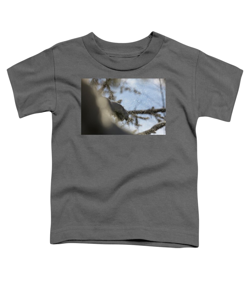 Abstract Toddler T-Shirt featuring the photograph Gusts of snow are being blown from spruce trees by Intensivelight