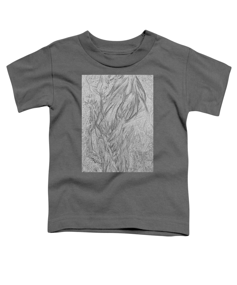 Abstract Toddler T-Shirt featuring the photograph Patterns left by the receding water in the sand of a beach - monochrome by Intensivelight