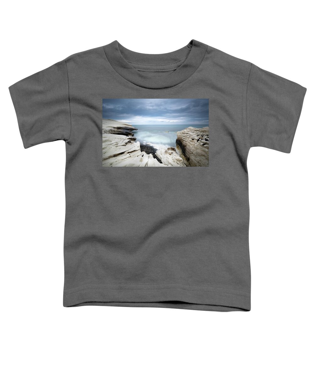 Seascape Toddler T-Shirt featuring the photograph Rocky coast with white limestones and cloudy sky by Michalakis Ppalis