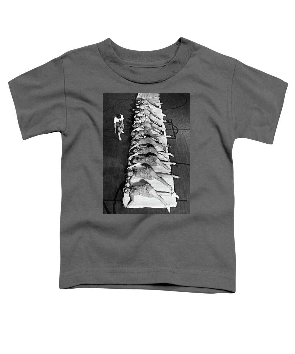 1920s Toddler T-Shirt featuring the photograph Women Exercising Lesson by Underwood Archives