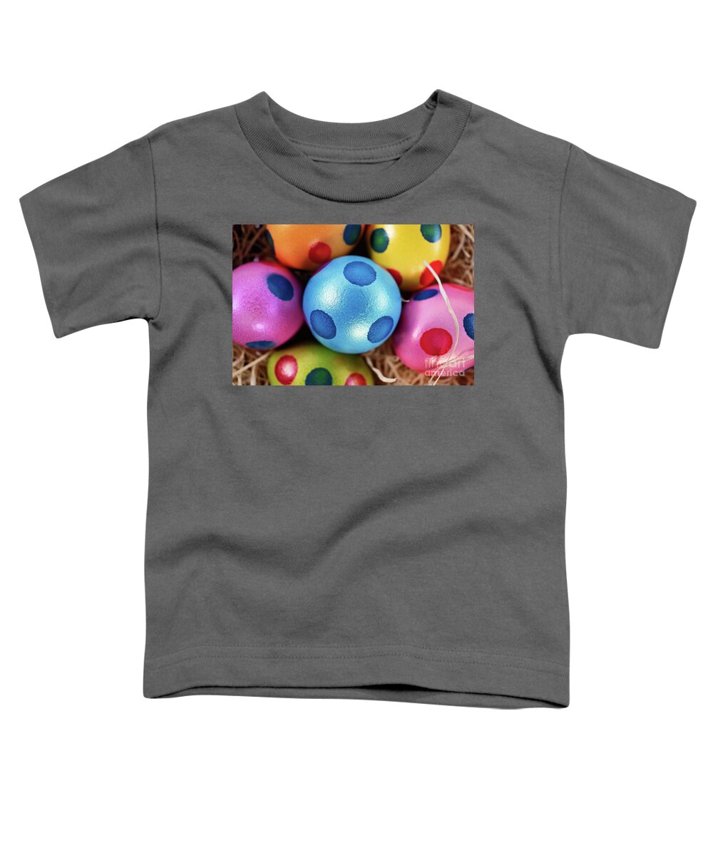 Easter Toddler T-Shirt featuring the photograph Colorful Easter eggs with polka dots in a basket #1 by Mendelex Photography