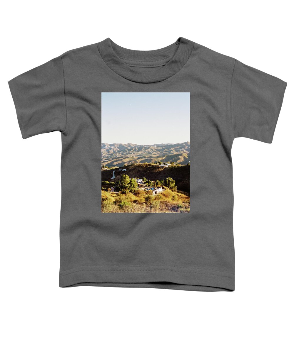 Travel Toddler T-Shirt featuring the photograph A house up in the mountains by Barthelemy de Mazenod