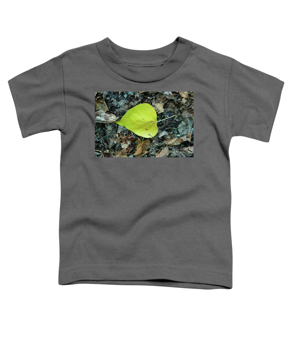 Leaf Toddler T-Shirt featuring the photograph A Leaf On The Ground by Jeff Swan