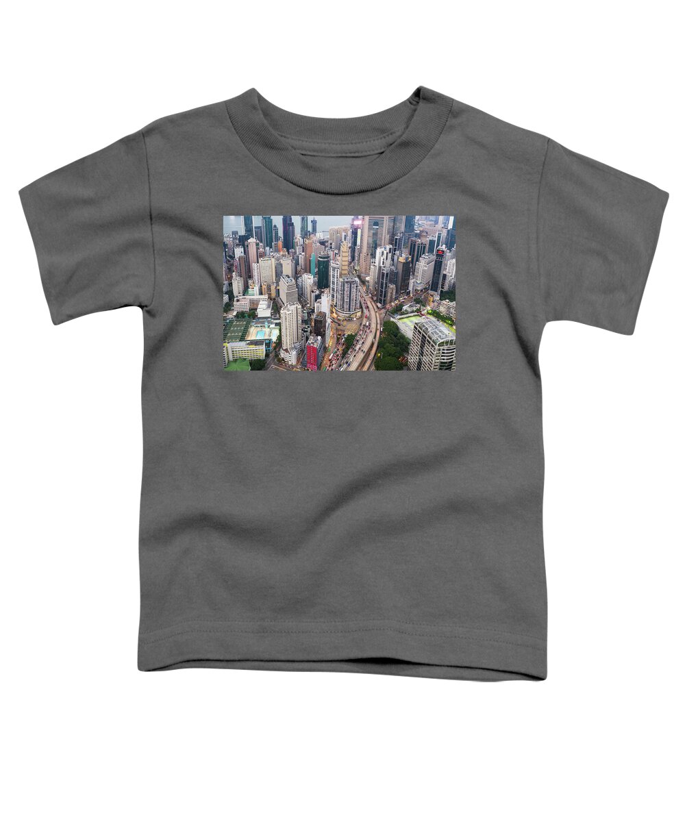 Asia Toddler T-Shirt featuring the photograph Aerial view of an highway through the very dense Causeway Bay in by Didier Marti