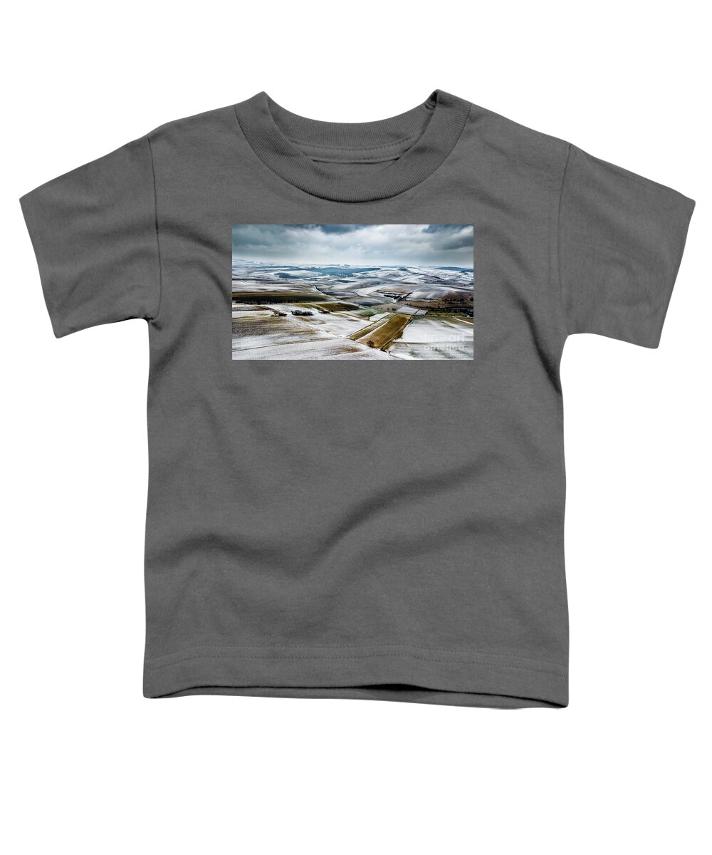 Above Toddler T-Shirt featuring the photograph Aerial View Of Winter Landscape With Remote Settlements And Snow Covered Fields In Austria by Andreas Berthold