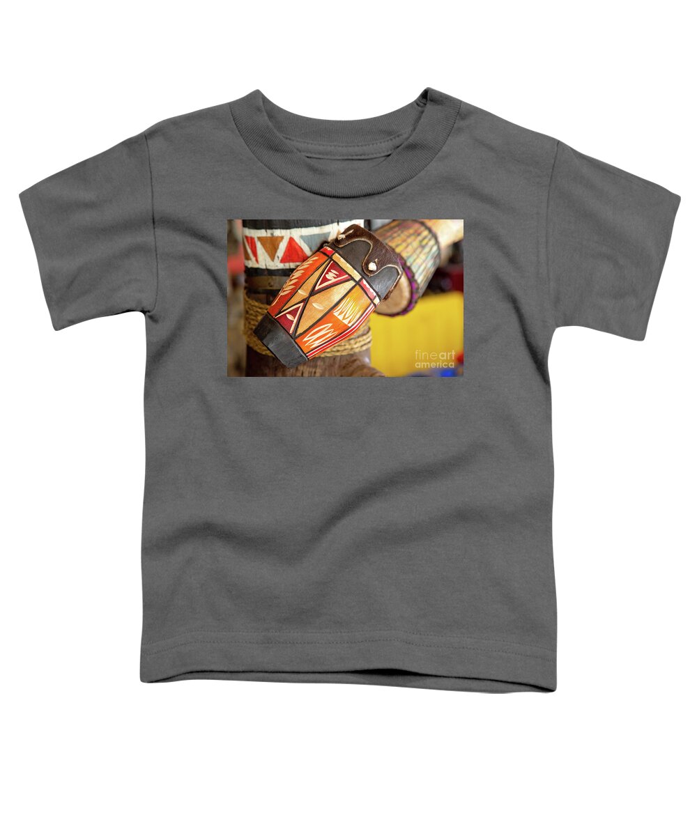 African Toddler T-Shirt featuring the photograph African drums by Jane Rix