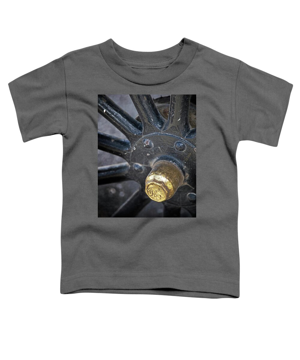 Ford Toddler T-Shirt featuring the photograph Antique Ford wheel by M Kathleen Warren