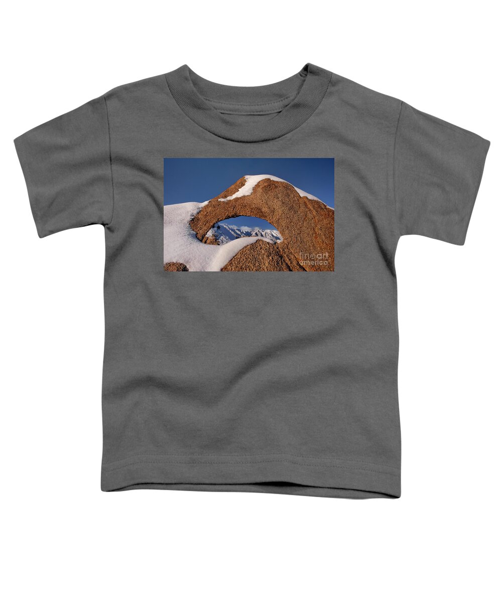 Dave Welling Toddler T-Shirt featuring the photograph Arch In Snow Alabama Hills California by Dave Welling