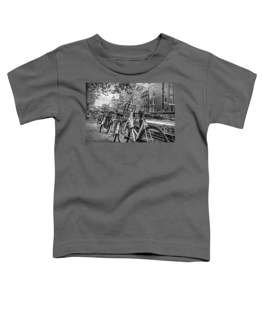 Boats Toddler T-Shirt featuring the photograph Bicycles of Every Type in Amsterdam by Debra and Dave Vanderlaan