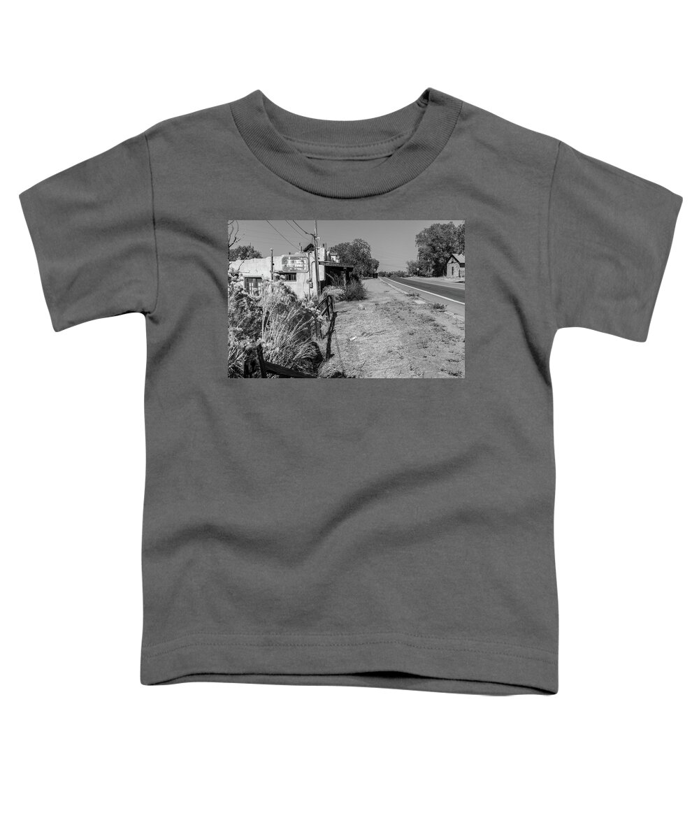 American Southwest Toddler T-Shirt featuring the photograph Coke sign on side of the road NM by John McGraw
