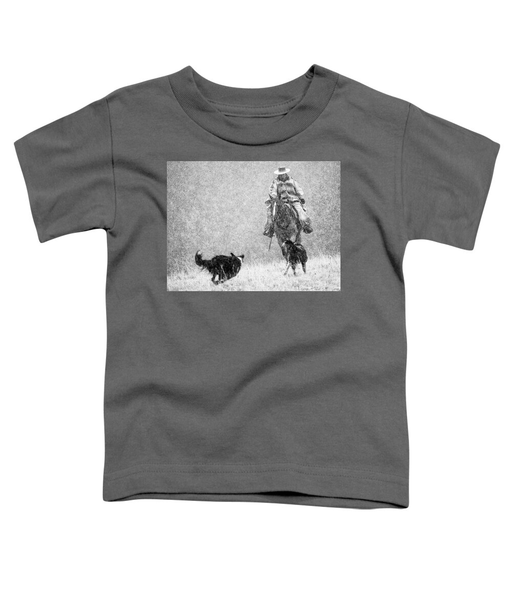 Cow Girl; Horse; Dogs ; Snow Toddler T-Shirt featuring the photograph Cow Girl and Dogs in Snow by Eggers Photography