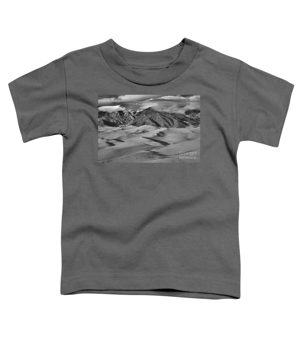 Colorado Toddler T-Shirt featuring the photograph Great Dunes And Shadows Below The Mountain Peaks Black And White by Adam Jewell