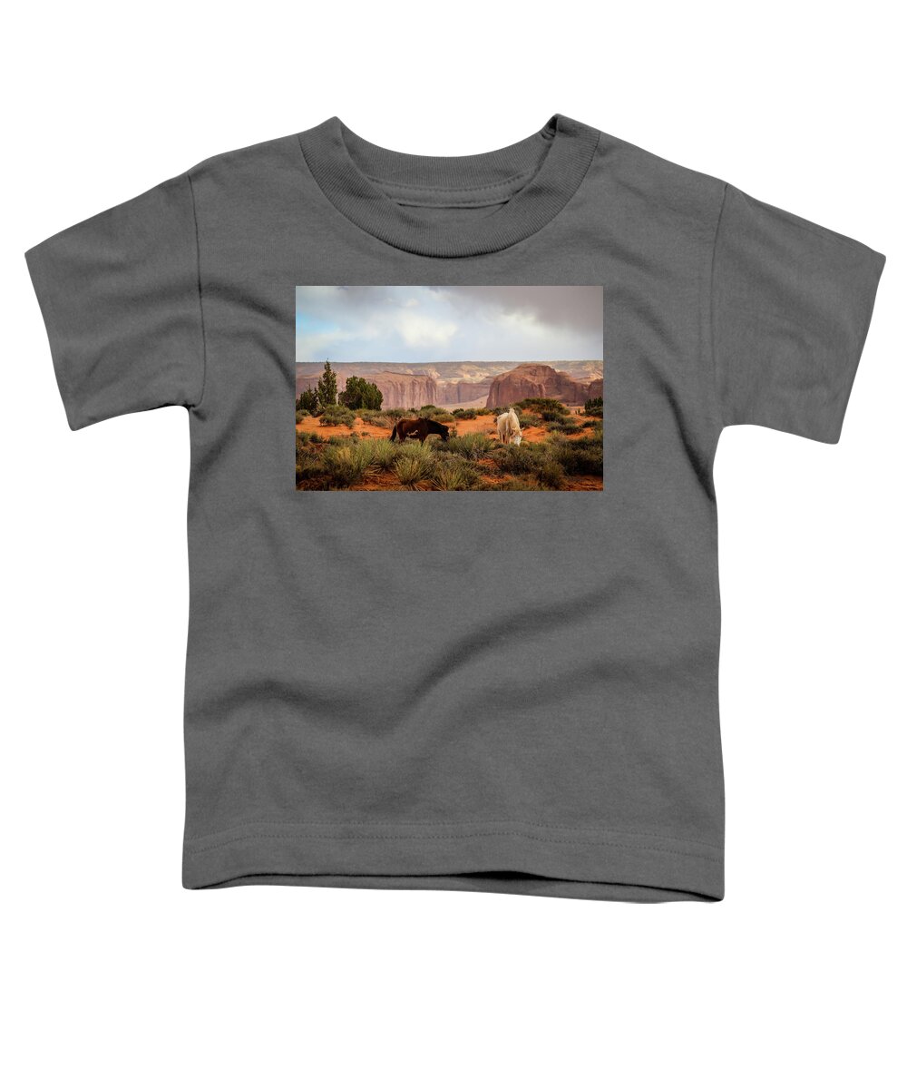 Monument Valley Toddler T-Shirt featuring the photograph Horses in Monument valley by Alberto Zanoni
