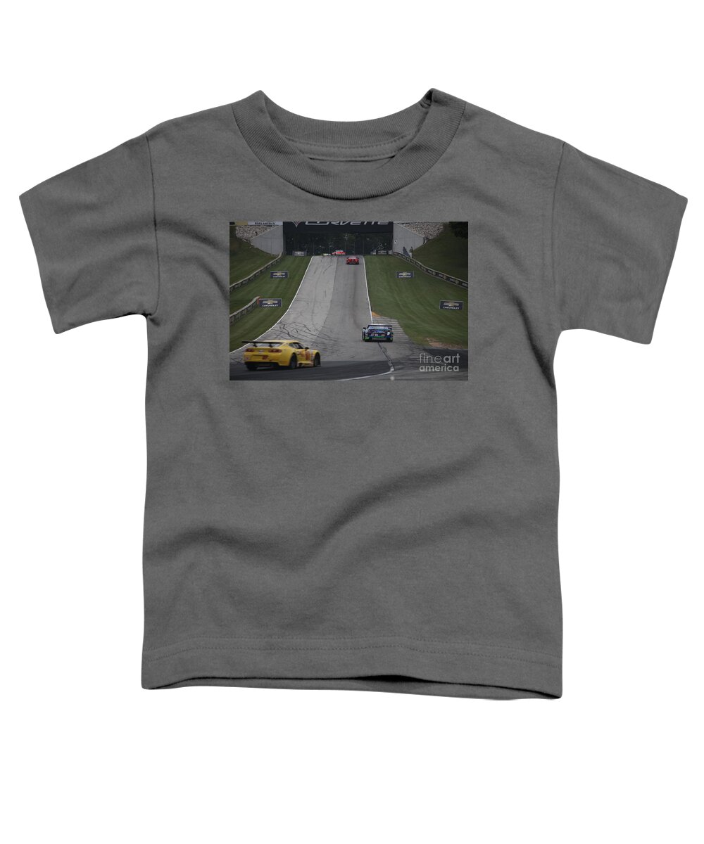 Race Cars Toddler T-Shirt featuring the photograph In and Out of Corvette by Richard Amble