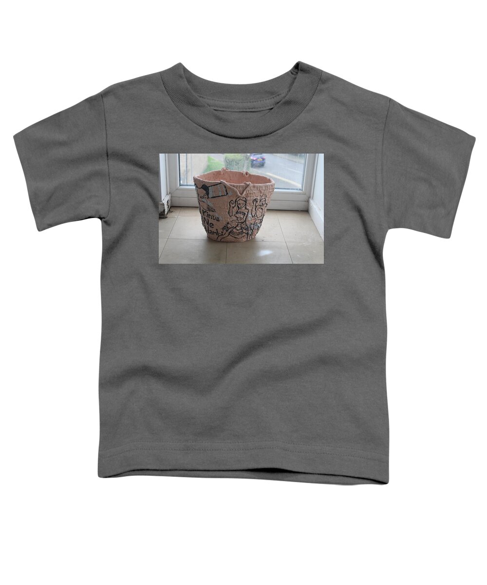 Jesus Toddler T-Shirt featuring the ceramic art Kintu and Nambi Legend on Kikapu Basket View One by Gloria Ssali