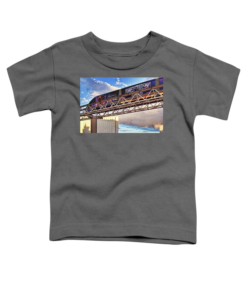 Las Vegas Monorail Toddler T-Shirt featuring the photograph Las Vegas Monorail riding above the city by Tatiana Travelways