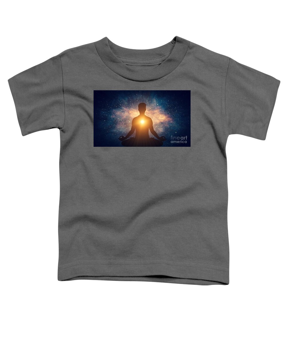 Yoga Toddler T-Shirt featuring the photograph Man and soul. Yoga lotus pose meditation on nebula galaxy background by Michal Bednarek