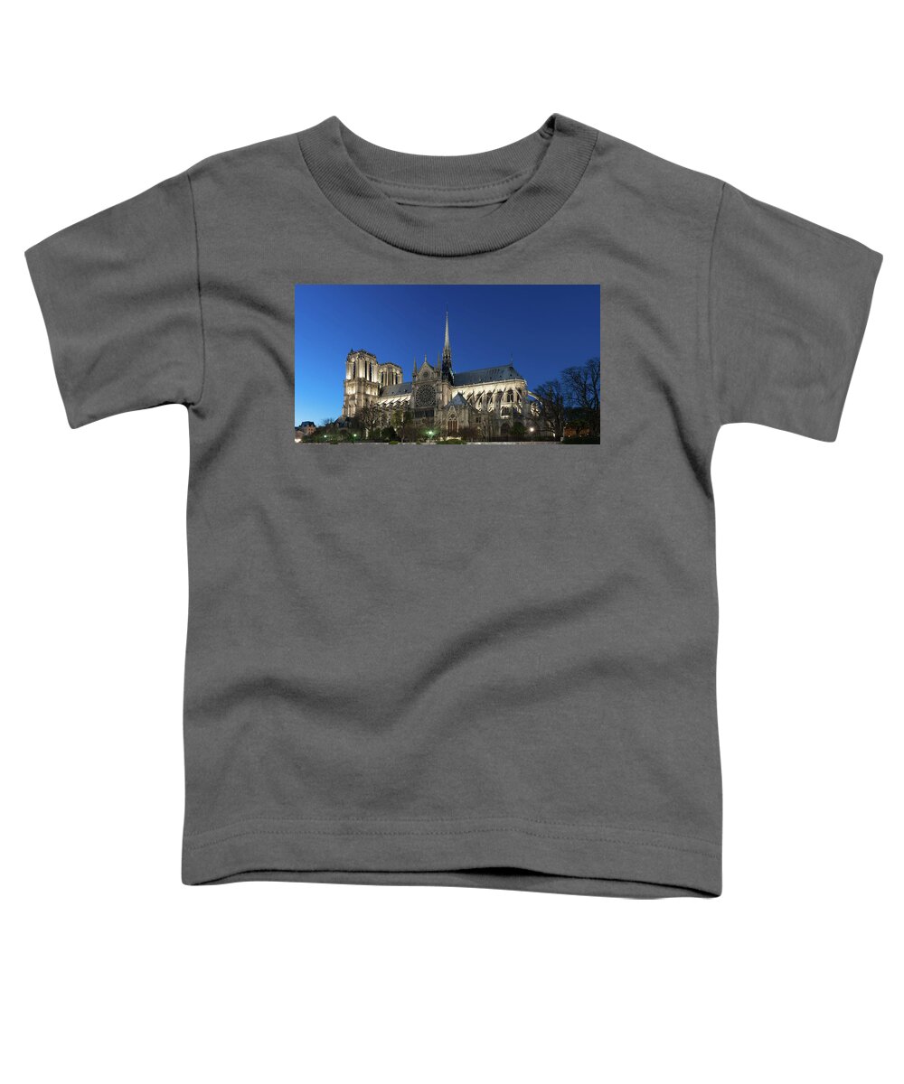 Notre-dame De Paris Toddler T-Shirt featuring the photograph Notre-Dame de Paris at blue hour by Philippe Lejeanvre