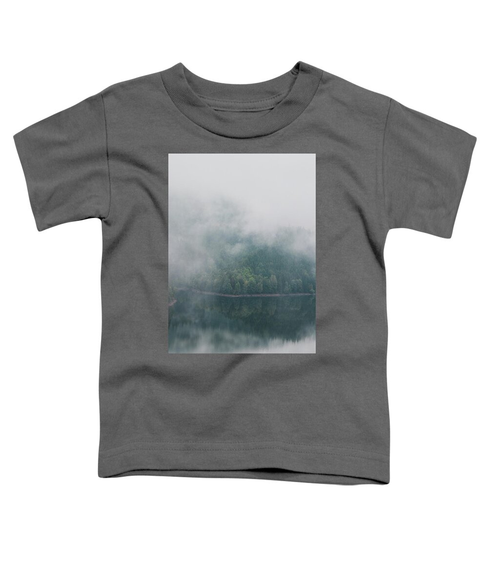 Climate Toddler T-Shirt featuring the photograph Rainy and foggy morning at the Sance Dam. Reflection of deciduous forest on the water surface. Autumn weather. Beskydy mountains, Czech republic. Green colour by Vaclav Sonnek